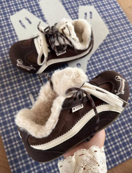 Brown Dachshund Wearing Plush Trainers